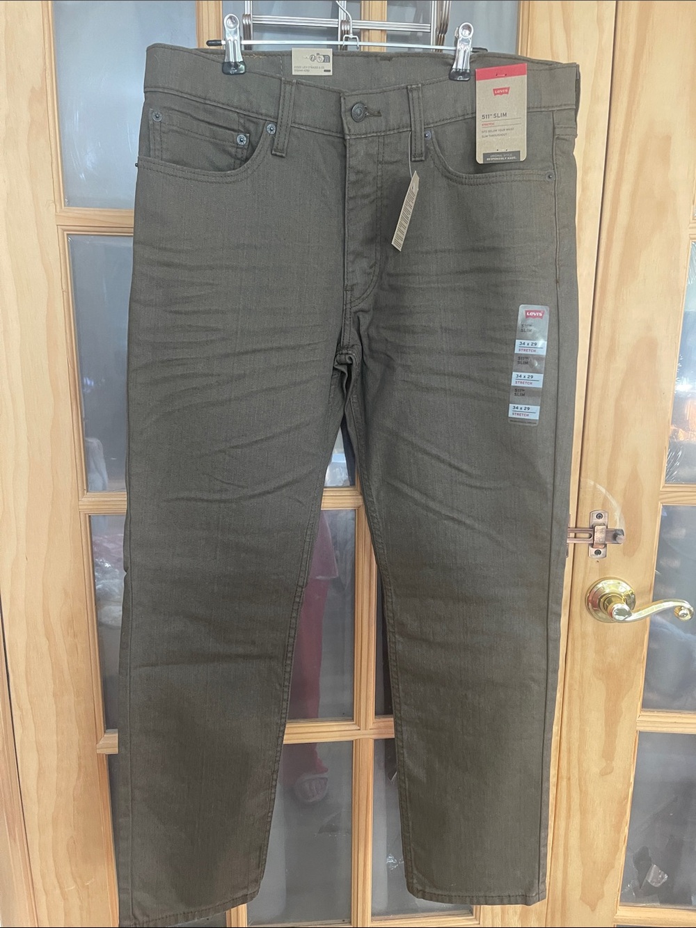 110. Levi's Men's Straight Jeans in Olive